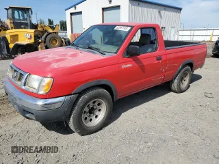 1998 Nissan Frontier XE with VIN 1N6DD21S2WC364538, listed as a Copart auction lot 62867545 with 261,987 mi miles and Salvage title. Bid and sale history available at DreamBid. Image 1.