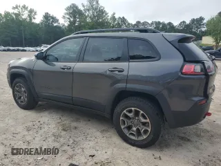 2022 Jeep Cherokee Trailhawk с VIN 1C4PJMBX1ND529146, выставлен на аукционе Copart как лот 56237365 с пробегом 26 718 миль миль и Списание • Salvage title. История ставок и продаж доступна на DreamBid. Изображение 2.