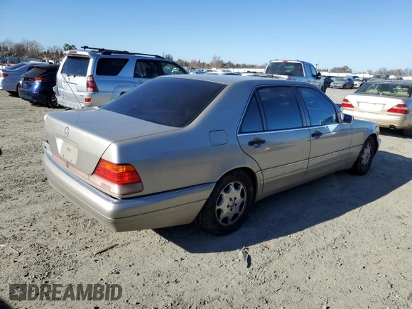 1996 Mercedes-Benz S with VIN WDBGA43E9TA311921, listed as a Copart auction lot 88758965 with 141,035 mi miles and Salvage Title. Bid and sale history available at DreamBid. Image 3.