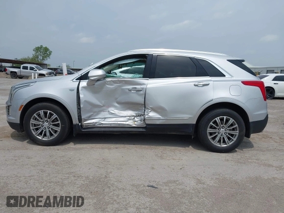 2017 Cadillac XT5 Luxury FWD z VIN 1GYKNBRS0HZ109439, wystawiony jako IAAI lot #42063044 z przebiegiem 79 851 mil mil oraz . Historia ofert i sprzedaży dostępna na DreamBid. Obrazek 14.