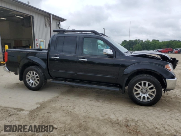 2011 Nissan Frontier Pro-4X with VIN 1N6AD0EVXBC433028, listed as a Copart auction lot 57653305 with 144,753 mi miles and Salvage title. Bid and sale history available at DreamBid. Image 4.