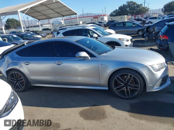 2016 Audi A7 3.0 Premium Plus with VIN WAUWGAFC8GN012047, listed as a IAAI auction lot 41012423 with 77,778 mi miles. Bid and sale history available at carsss.com. Image 14.