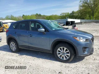 2016 Mazda CX-5 Sport with VIN JM3KE4BY8G0745522, listed as a Copart auction lot 56621825 with 98,757 mi miles and Salvage title. Bid and sale history available at DreamBid. Image 4.