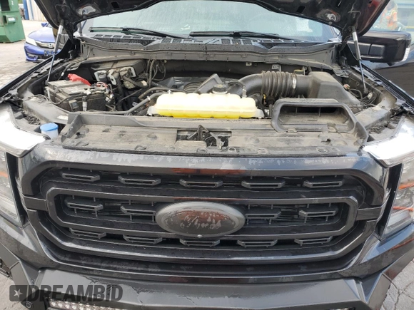 2023 Ford F-150 XL with VIN 1FTFW1E5XPKD88243, listed as a Copart auction lot 62351105 with 29,046 mi miles and Salvage title. Bid and sale history available at DreamBid. Image 11.