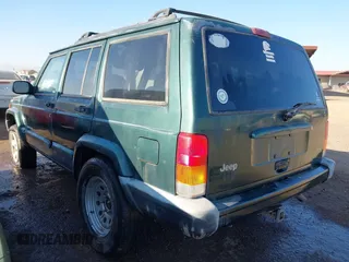 1999 Jeep Cherokee Sport with VIN 1J4FT68S6XL579735, listed as a IAAI auction lot 41484413 with 146,862 mi miles and . Bid and sale history available at DreamBid. Image 3.