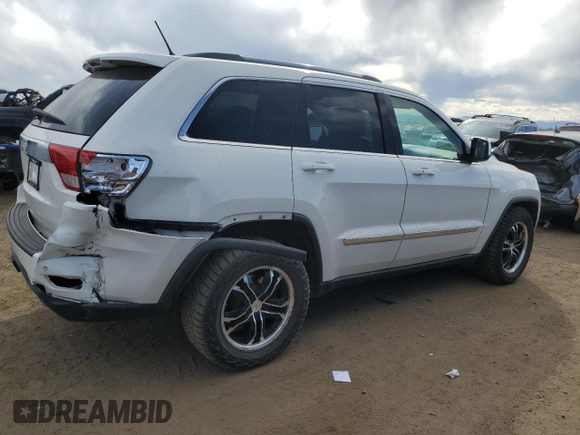 2011 Jeep Grand Cherokee Laredo with VIN 1J4RR4GG8BC718852, listed as a Copart auction lot 49852535 with 101,945 mi miles and Salvage Title. Bid and sale history available at carsss.com. Image 3.