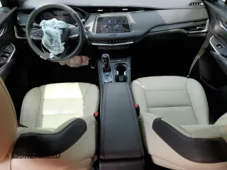 2020 Cadillac XT4 FWD Sport z VIN 1GYFZER49LF054184, wystawiony jako Copart lot #50274585 z przebiegiem 28 341 mil mil oraz Szkoda całkowita • Salvage title. Historia ofert i sprzedaży dostępna na DreamBid. Obrazek 8.