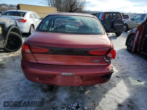 1999 Ford Escort SE z VIN 1FAFP13P2XW277282, wystawiony jako Copart lot #88804865 z przebiegiem 164 056 mil mil oraz Szkoda całkowita • Salvage title. Historia ofert i sprzedaży dostępna na DreamBid. Obrazek 6.