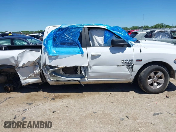 2021 Ram 1500 SLT with VIN 1C6RR6TTXMS517345, listed as a IAAI auction lot 42314123 with 107,307 mi miles and . Bid and sale history available at DreamBid. Image 13.