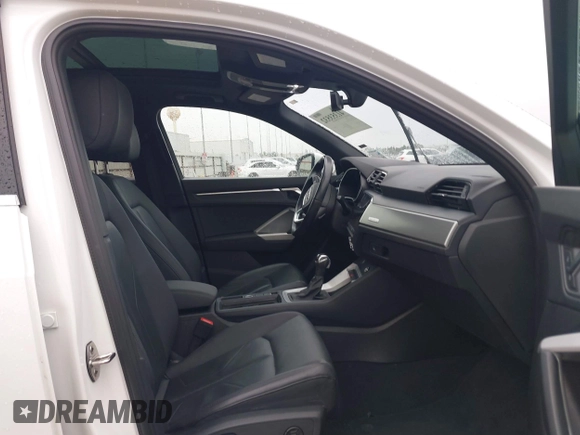 2023 Audi Q3 S line Premium with VIN WA1DECF35P1127797, listed as a IAAI auction lot 41353532 with 34,581 mi miles and . Bid and sale history available at DreamBid. Image 5.