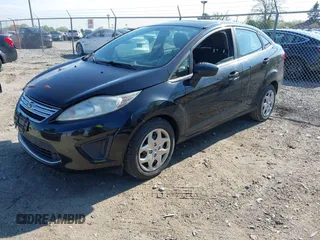2011 Ford Fiesta SE with VIN 3FADP4BJ4BM144991, listed as a IAAI auction lot 42202406 with 67,448 mi miles and . Bid and sale history available at carsss.com. Image 2.
