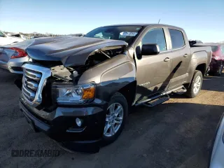 2019 GMC Canyon 4WD SLE with VIN 1GTG6CEN0K1266330, listed as a Copart auction lot 87117014 with 42,096 mi miles and Salvage Title. Bid and sale history available at carsss.com. Image 1.