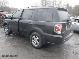 2006 Honda Pilot EX with VIN 2HKYF18486H527682, listed as a IAAI auction lot 41941295 with 235,521 mi miles. Bid and sale history available at carsss.com. Image 3.