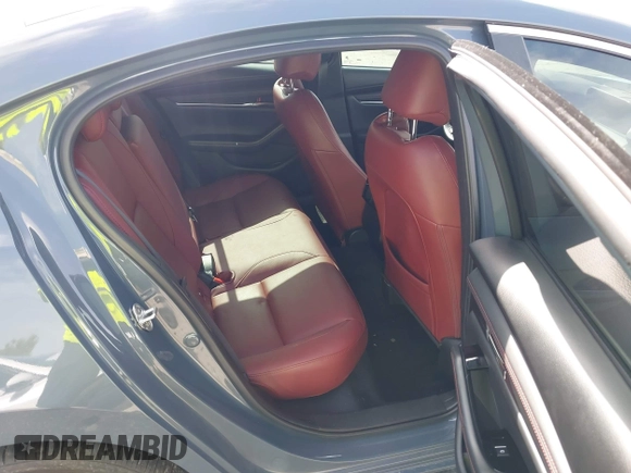 2024 Mazda 3 S Carbon Edition with VIN 3MZBPBCM2RM403824, listed as a IAAI auction lot 42612315 with 8,261 mi miles and . Bid and sale history available at DreamBid. Image 8.