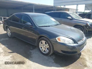 2014 Chevrolet Impala LT z VIN 2G1WB5E36E1142054, wystawiony jako IAAI lot #42023366 z przebiegiem 130 863 mil mil oraz . Historia ofert i sprzedaży dostępna na DreamBid. Obrazek 1.