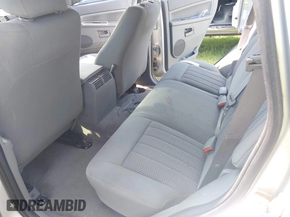 2006 Jeep Grand Cherokee Laredo with VIN 1J4GS48K56C260532, listed as a IAAI auction lot 42607110 with 153,110 mi miles and . Bid and sale history available at DreamBid. Image 8.