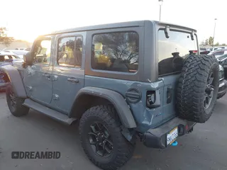 2024 Jeep Wrangler Sport S with VIN 1C4RJXN64RW337985, listed as a IAAI auction lot 41261982 with 1,845 mi miles and . Bid and sale history available at DreamBid. Image 14.