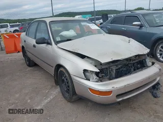 1995 Toyota Corolla DX with VIN 1NXAE09B7SZ337590, listed as a IAAI auction lot 42390900 with 133,495 mi miles and . Bid and sale history available at DreamBid. Image 1.