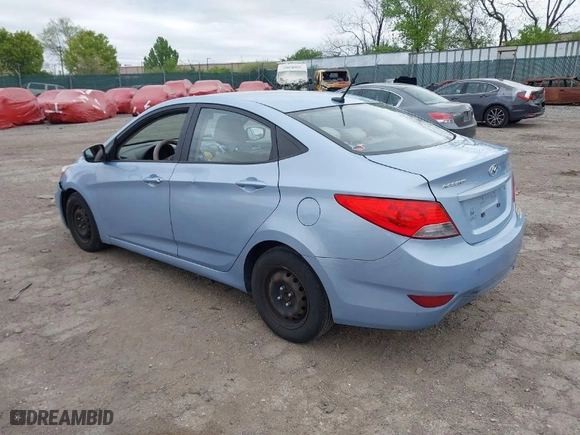 2014 Hyundai Accent GLS with VIN KMHCT4AE3EU702573, listed as a IAAI auction lot 42083350 with 123,392 mi miles. Bid and sale history available at carsss.com. Image 3.