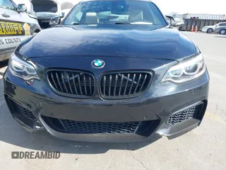 2015 BMW 2 Series M235i with VIN WBA1J7C55FV358964, listed as a IAAI auction lot 41674800 with 63,504 mi miles and . Bid and sale history available at carsss.com. Image 12.