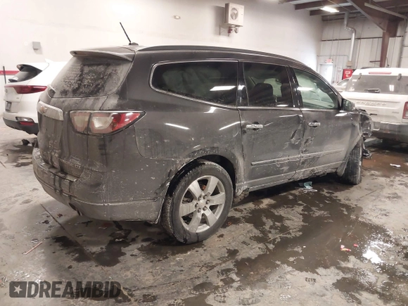 2015 Chevrolet Traverse LTZ with VIN 1GNKVJKD8FJ360899, listed as a IAAI auction lot 41634924 with 165,835 mi miles and . Bid and sale history available at DreamBid. Image 4.