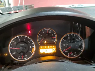2014 Nissan Titan Pro-4X z VIN 1N6AA0EC6EN501437, wystawiony jako Copart lot #82822234 z przebiegiem 131 112 mil mil oraz Szkoda całkowita • Salvage title. Historia ofert i sprzedaży dostępna na DreamBid. Obrazek 9.