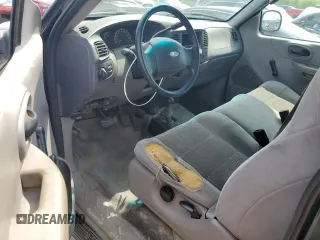 2003 Ford F-150 XL with VIN 2FTPX18L13CA34024, listed as a Copart auction lot 62133645 with 224,922 mi miles and Salvage title. Bid and sale history available at DreamBid. Image 8.