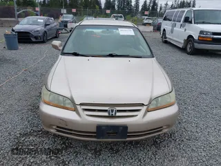 2001 Honda Accord LX z VIN JHMCG56471C028960, wystawiony jako IAAI lot #42223734 z przebiegiem 387 033 mil mil oraz . Historia ofert i sprzedaży dostępna na DreamBid. Obrazek 13.