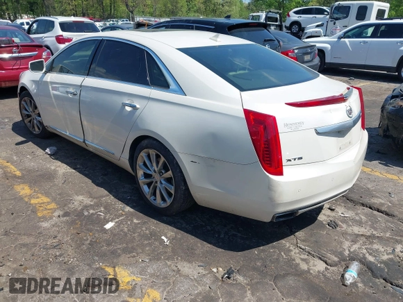 2014 Cadillac XTS Luxury with VIN 2G61M5S32E9310910, listed as a IAAI auction lot 41978298 with Not provided miles and . Bid and sale history available at DreamBid. Image 3.