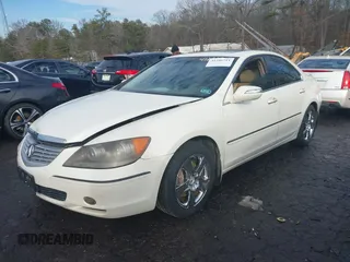 2006 Acura RL z VIN JH4KB16546C002058, wystawiony jako IAAI lot #41286711 z przebiegiem 297 234 mil mil oraz . Historia ofert i sprzedaży dostępna na DreamBid. Obrazek 17.