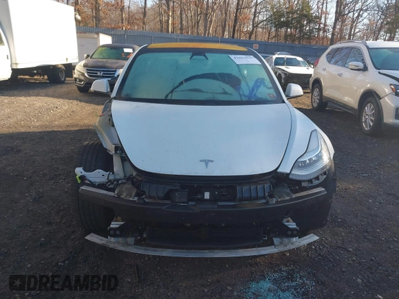 2018 Tesla Model 3 Long Range Battery with VIN 5YJ3E1EA0JF153146, listed as a IAAI auction lot 41621919 with 76,794 mi miles and . Bid and sale history available at DreamBid. Image 12.