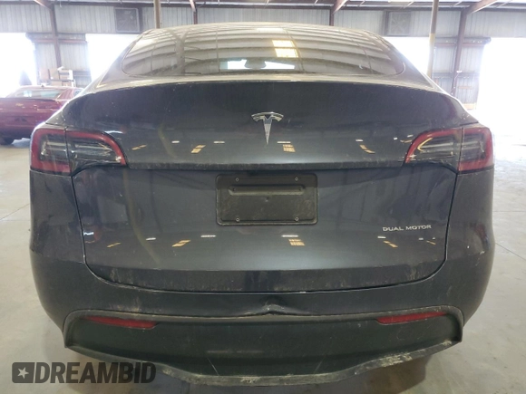 2023 Tesla Model Y Long Range z VIN 7SAYGDEE3PF862038, wystawiony jako Copart lot #57639325 z przebiegiem 11 020 mil mil oraz Szkoda całkowita • Salvage title. Historia ofert i sprzedaży dostępna na DreamBid. Obrazek 6.