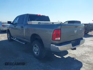 2012 Ram 2500 ST with VIN 3C6TD5CT9CG330893, listed as a IAAI auction lot 41845441 with 125,107 mi miles. Bid and sale history available at carsss.com. Image 3.