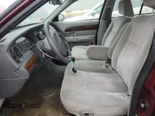 2005 Mercury Grand Marquis GS with VIN 2MEFM74W05X604628, listed as a Copart auction lot 51332335 with 165,224 mi miles and Salvage Title. Bid and sale history available at DreamBid. Image 7.