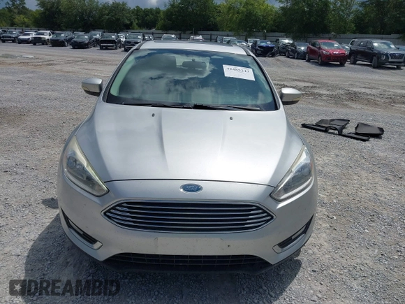 2018 Ford Focus Titanium with VIN 1FADP3N29JL232336, listed as a IAAI auction lot 42485243 with 82,113 mi miles and . Bid and sale history available at DreamBid. Image 12.