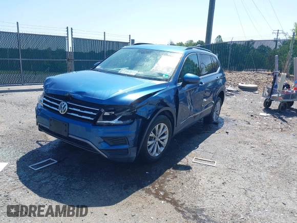 2018 Volkswagen Tiguan SEL with VIN 3VV2B7AX9JM143441, listed as a IAAI auction lot 42351115 with 160,646 mi miles and . Bid and sale history available at DreamBid. Image 2.