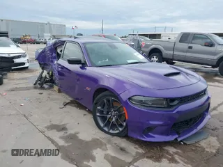 2023 Dodge Charger Scat Pack Widebody with VIN 2C3CDXGJ5PH699595, listed as a IAAI auction lot 41303894 with 1,828 mi miles. Bid and sale history available at carsss.com. Image 1.