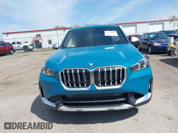 2023 BMW X1 xDrive28i with VIN WBX73EF00P5W52935, listed as a IAAI auction lot 42221084 with 16,394 mi miles and . Bid and sale history available at DreamBid. Image 12.