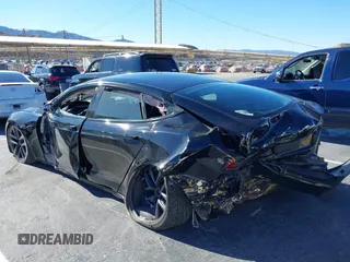 2022 Tesla Model S with VIN 5YJSA1E52NF476906, listed as a IAAI auction lot 41320074 with Not Provided miles and . Bid and sale history available at DreamBid. Image 6.