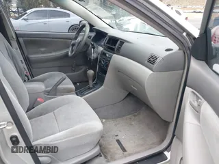 2004 Toyota Corolla CE with VIN 1NXBR32E24Z275615, listed as a IAAI auction lot 42180665 with 210,598 mi miles and . Bid and sale history available at DreamBid. Image 5.
