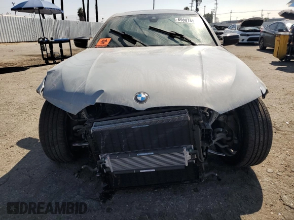 2024 BMW 3 Series M340i with VIN 3MW49FS04R8E27589, listed as a Copart auction lot 69801894 with 0 mi miles and Salvage Title. Bid and sale history available at carsss.com. Image 5.