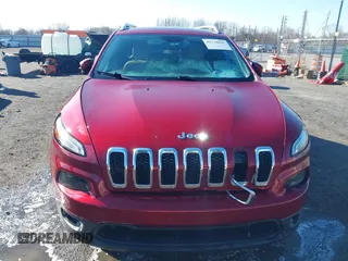 2015 Jeep Cherokee Latitude with VIN 1C4PJLCB4FW730607, listed as a IAAI auction lot 41738845 with 202,216 mi miles and . Bid and sale history available at DreamBid. Image 6.