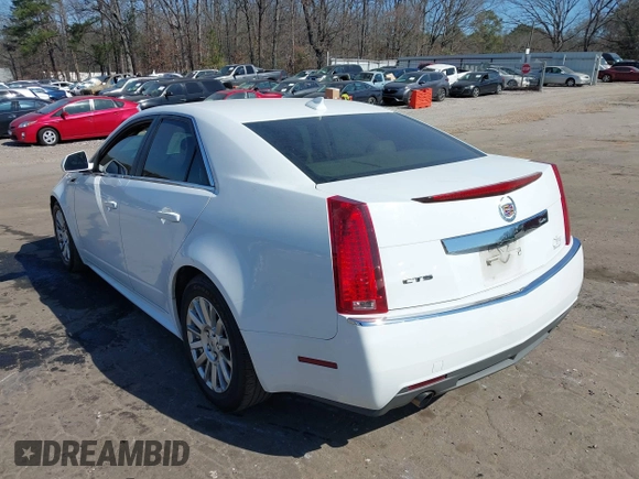 2011 Cadillac CTS Luxury with VIN 1G6DE5EY5B0119957, listed as a IAAI auction lot 41642172 with 228,401 mi miles and . Bid and sale history available at DreamBid. Image 3.