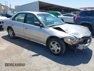 1999 Honda Accord EX z VIN JHMCG6675XC014533, wystawiony jako IAAI lot #42497082 z przebiegiem 203 236 mil mil oraz . Historia ofert i sprzedaży dostępna na DreamBid. Obrazek 1.