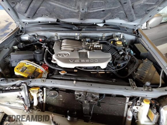 2001 Infiniti QX4 with VIN JNRDR09X21W204448, listed as a Copart auction lot 82619574 with 114,520 mi miles and Salvage Title. Bid and sale history available at DreamBid. Image 12.