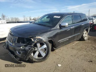 2014 Jeep Grand Cherokee Overland with VIN 1C4RJFCG8EC437489, listed as a Copart auction lot 41781595 with 174,862 mi miles and Salvage Title. Bid and sale history available at carsss.com. Image 1.