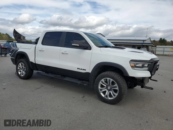 2020 Ram 1500 Rebel with VIN 1C6SRFLM1LN230872, listed as a Copart auction lot 55671585 with 97,202 mi miles and Salvage title. Bid and sale history available at DreamBid. Image 4.