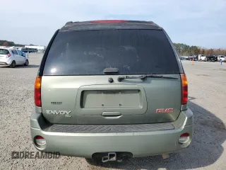 2004 GMC Envoy XL SLE with VIN 1GKET16S346115131, listed as a Copart auction lot 82677024 with 290,656 mi miles and Salvage Title. Bid and sale history available at carsss.com. Image 6.