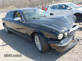 2007 Jaguar XJ 8 LWB z VIN SAJWA79B77SH17986, wystawiony jako IAAI lot #42006259 z przebiegiem 145 828 mil mil oraz . Historia ofert i sprzedaży dostępna na DreamBid. Obrazek 1.