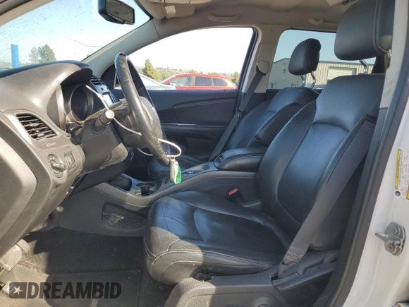 2017 Dodge Journey Crossroad Plus with VIN 3C4PDCGGXHT602670, listed as a Copart auction lot 54556675 with 179,702 mi miles and Salvage title. Bid and sale history available at DreamBid. Image 7.